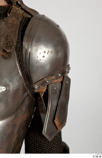  Photos Medieval Knight in plate armor 13 Medieval clothing Medieval knight buckle plate armor shoulder upper body 0002.jpg